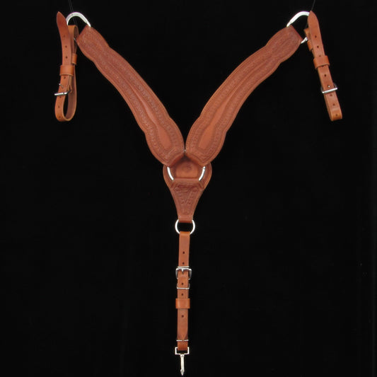 Brown leather saddle breastcollar on a black background